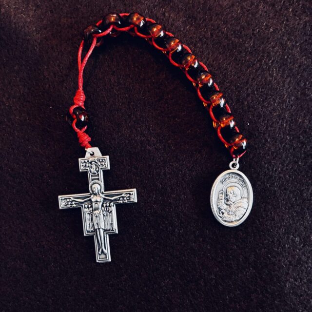 Cross and medal on a string