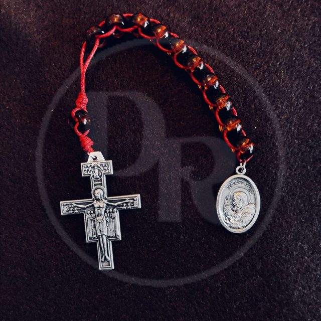 Cross and medal on a string